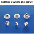 Inserts for stone and solid surfaces