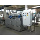 Industrial conveyor belt washing machines